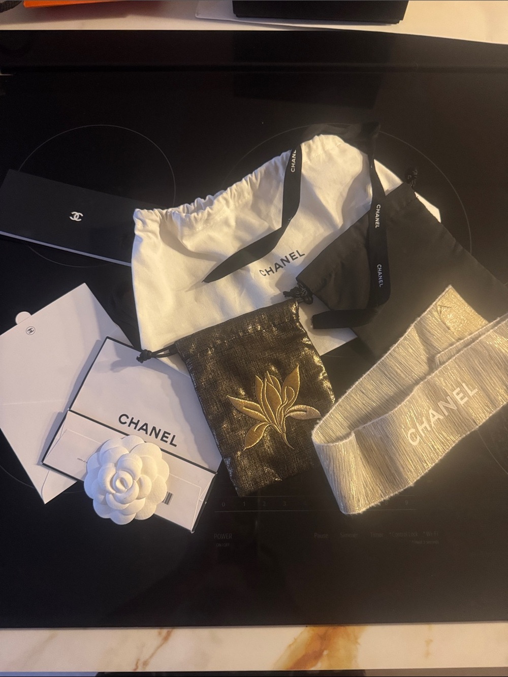 CHANEL White and Black Branded Accessory Pouches and Camellia Accent